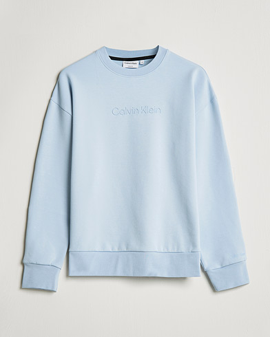 Men | Sweaters & Knitwear | Calvin Klein | Debossed Logo Crew Neck Sweatshirt Bayshore Blue
