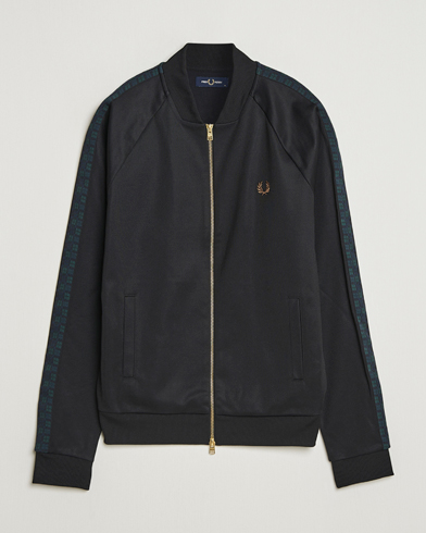 Fred Perry Taped Track Jacket Black at CareOfCarl.com Fred Perry Taped Track Jacket Black at CareOfCarl.com