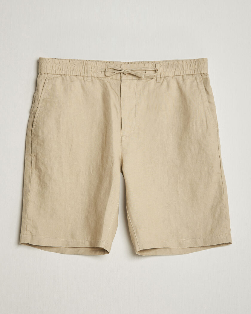 Auralee Finx Linen Easy Shorts Ecru at CareOfCarl.com