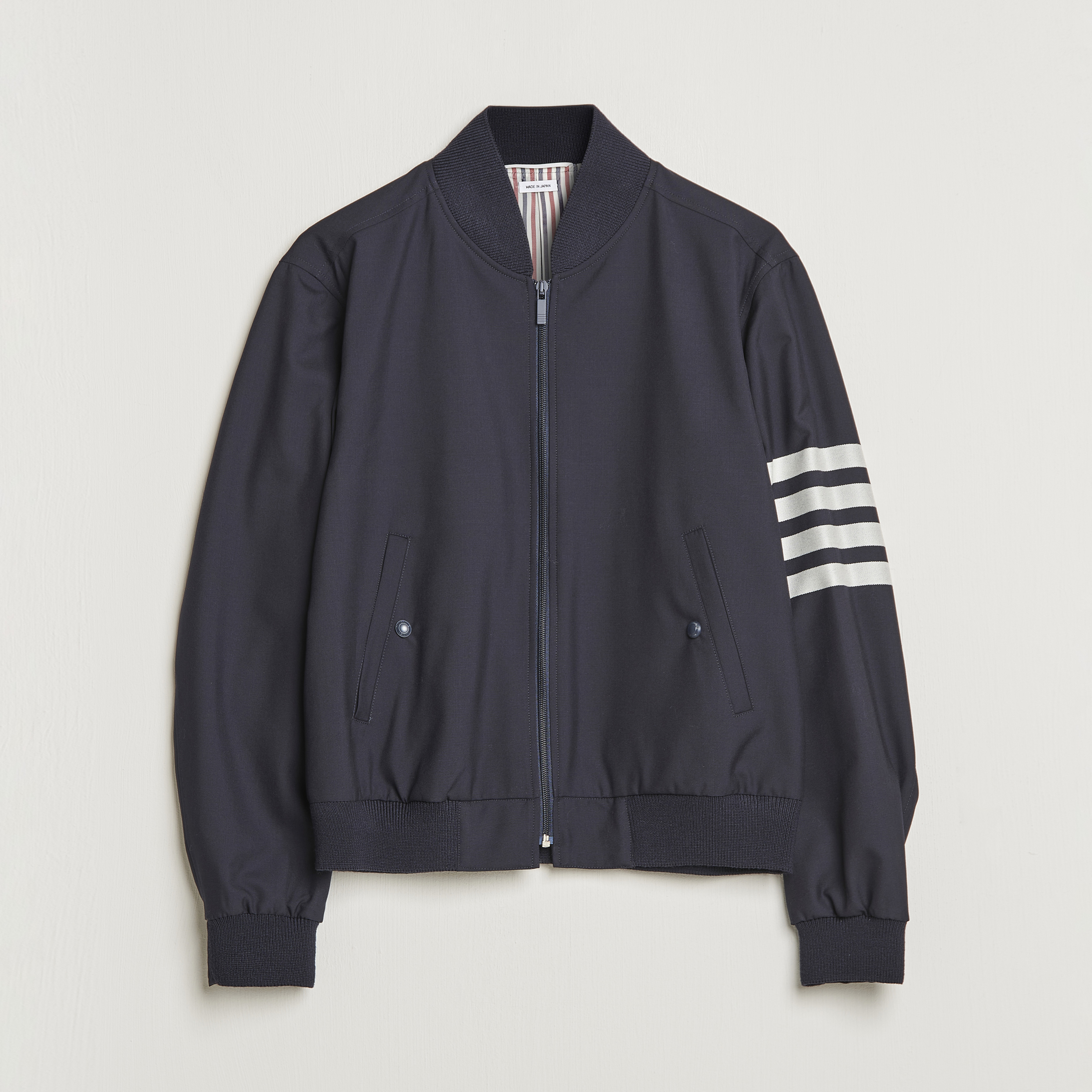Thom Browne 4-Bar Blouson Jacket Navy at CareOfCarl.com Thom Browne 4-Bar Blouson Jacket Navy at CareOfCarl.com