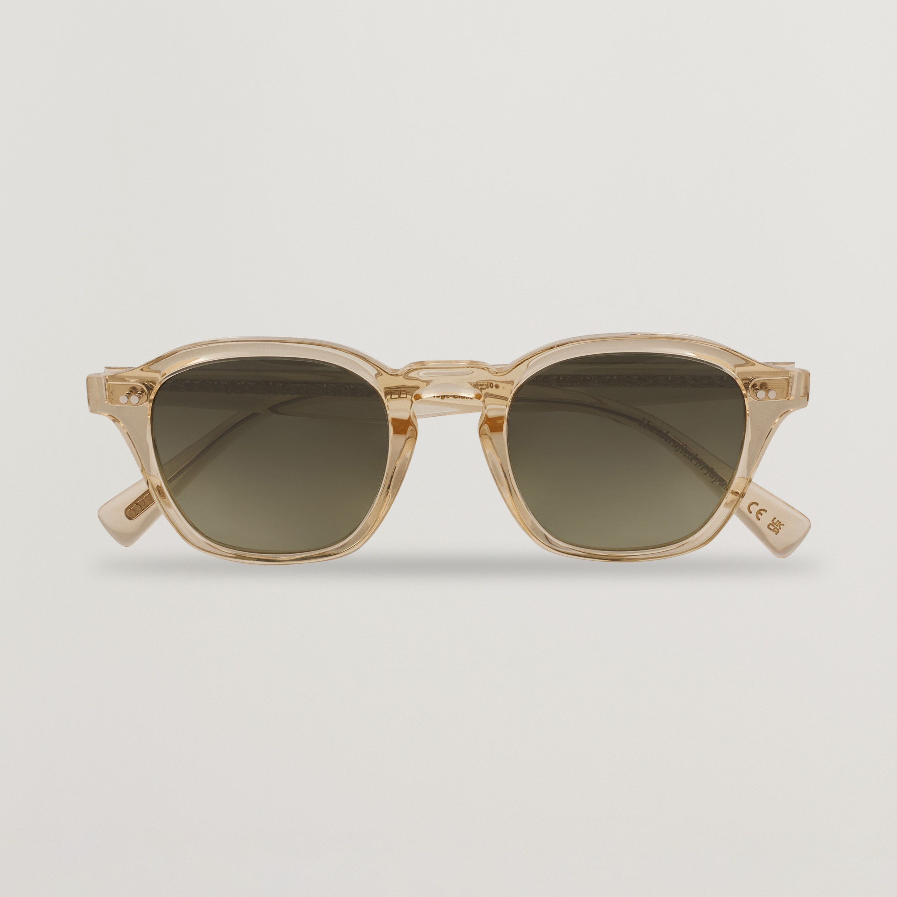 Oliver Peoples Eyles Sunglasses in Yellow Beige G15 Gradient Golden hour glamour. She wears Eyles in Black + Sandstone  main image 4