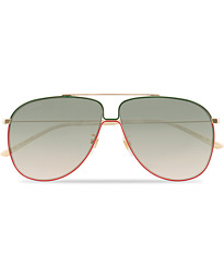Gucci GG0440S Sunglasses Gold/Green at CareOfCarl.com