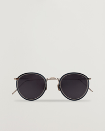 Eyevan 7285 717E Sunglasses Dark Brown at CareOfCarl.com