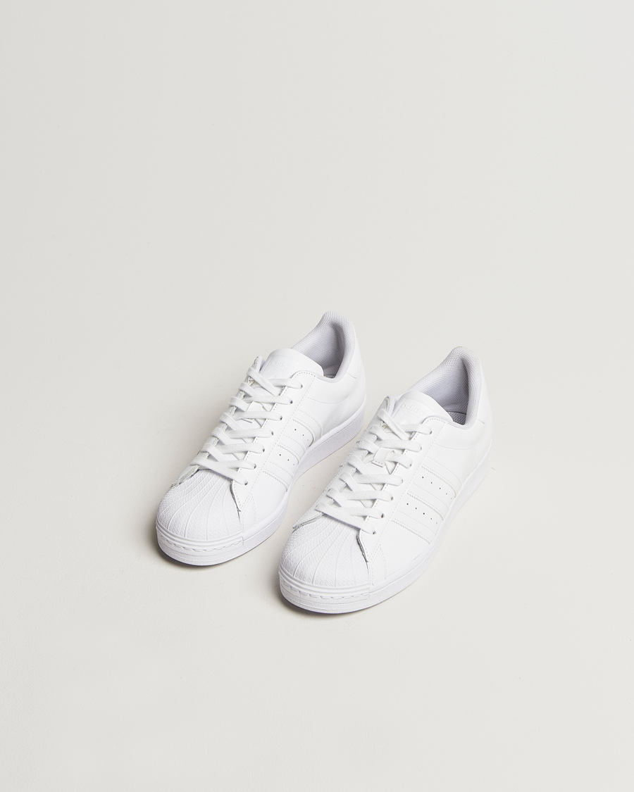 adidas Originals Superstar Sneaker White at CareOfCarl.com adidas Originals Superstar Sneaker White at CareOfCarl.com