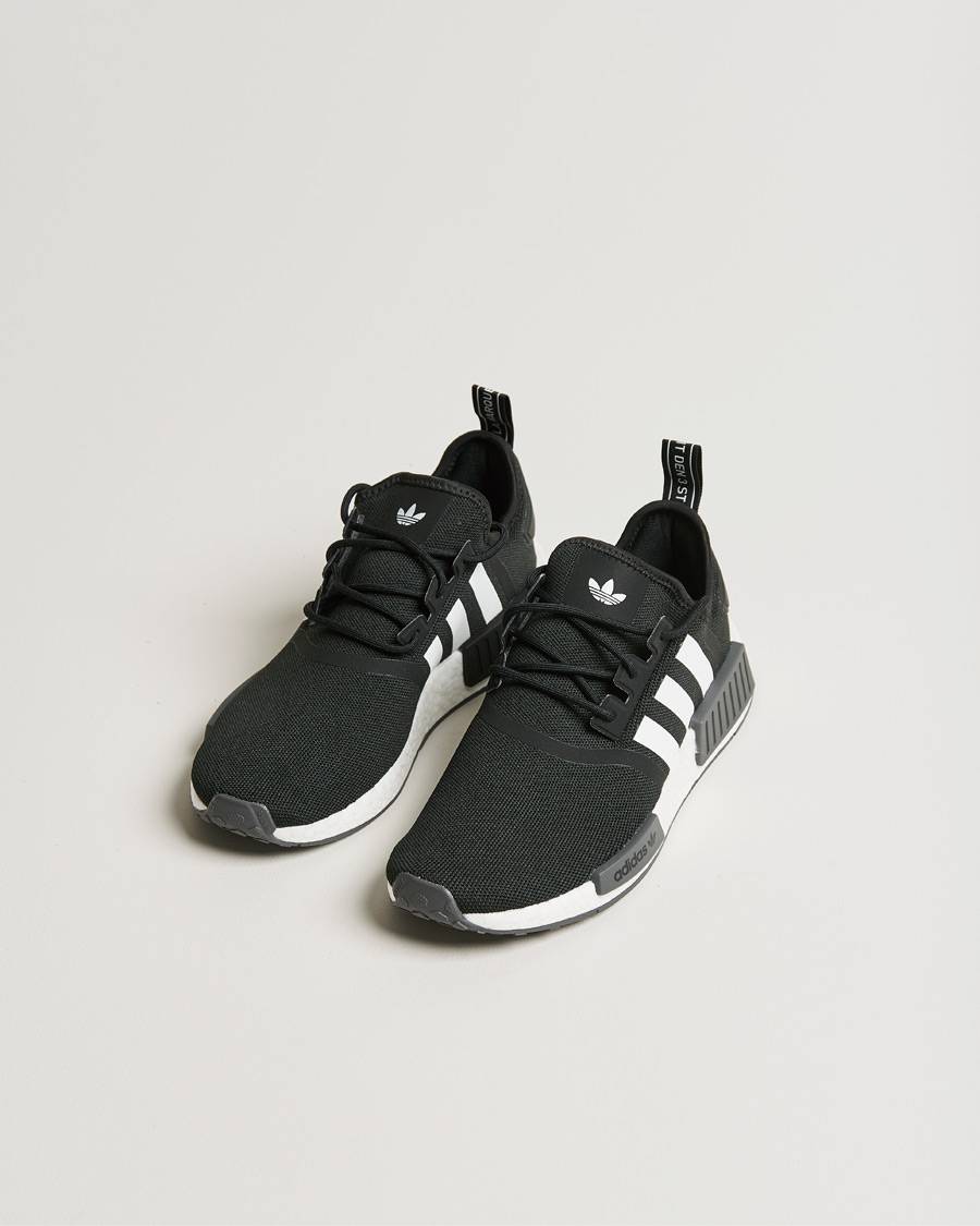 adidas Originals NMD R1 Sneaker Black at CareOfCarl.com adidas Originals NMD R1 Sneaker Black at CareOfCarl.com