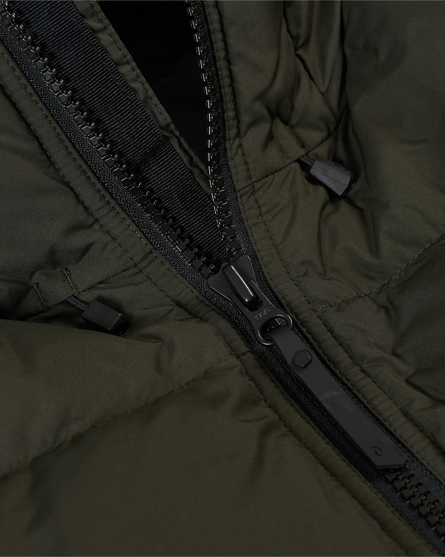 Men | Coats & Jackets | Peak Performance | Rivel Down Hooded Jacket Olive Extreme