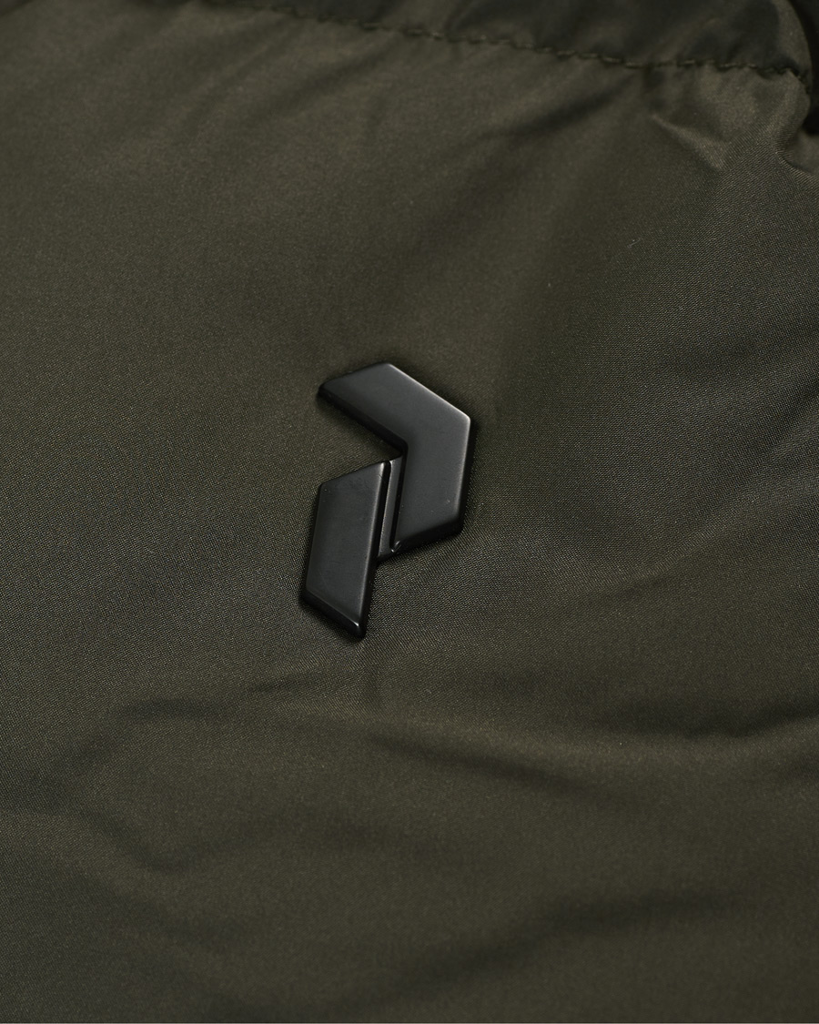 Men | Coats & Jackets | Peak Performance | Rivel Down Hooded Jacket Olive Extreme