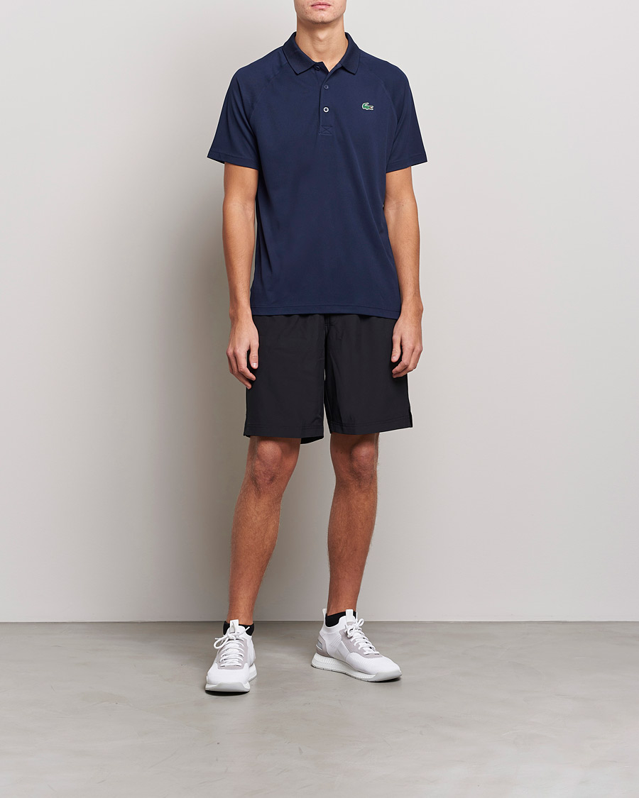 Men |  | Lacoste Sport | Performance Ribbed Collar Polo Navy Blue