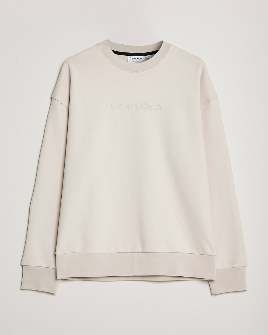 Men | Sweaters & Knitwear | Calvin Klein | Debossed Logo Crew Neck Sweatshirt Stony Beige