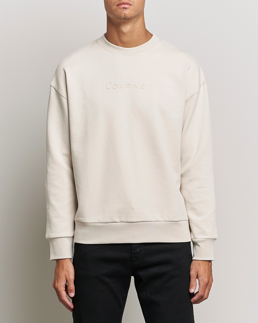 Men |  | Calvin Klein | Debossed Logo Crew Neck Sweatshirt Stony Beige