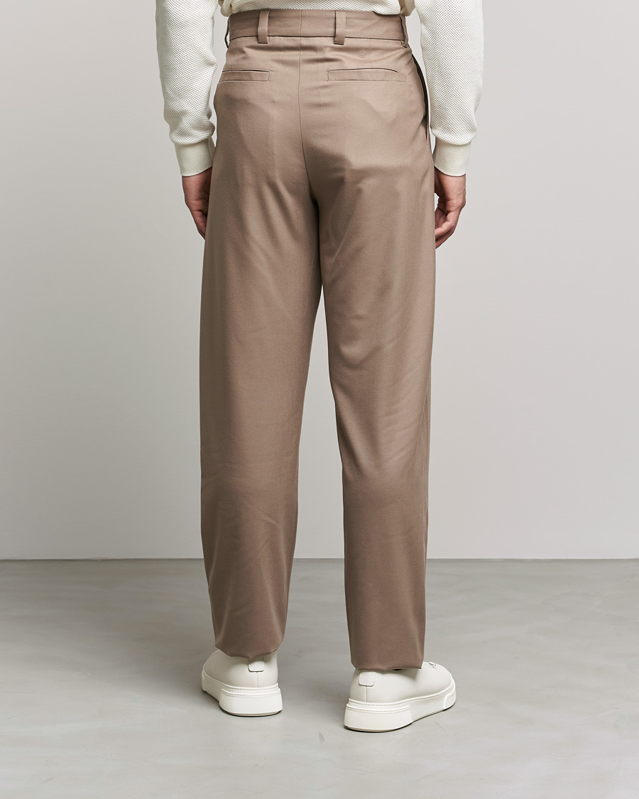 Men | Trousers | Giorgio Armani | Tapered Pleated Flannel Trousers Beige