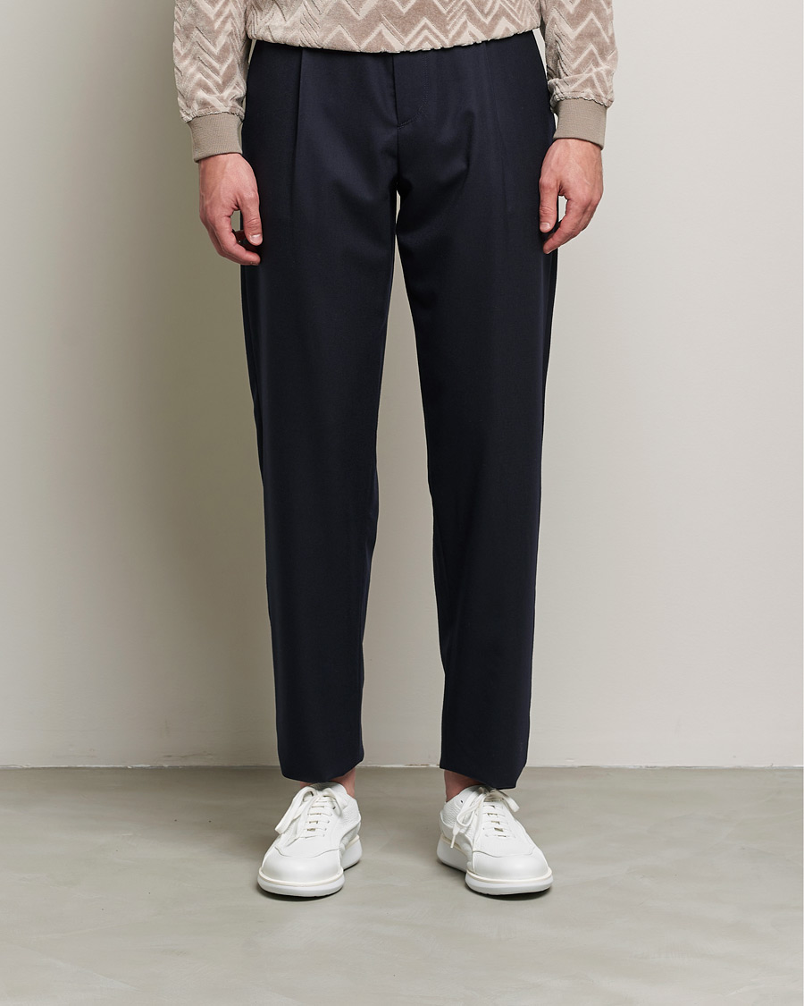 Giorgio Armani Tapered Pleated Flannel Trousers Navy at CareOfCarl.com