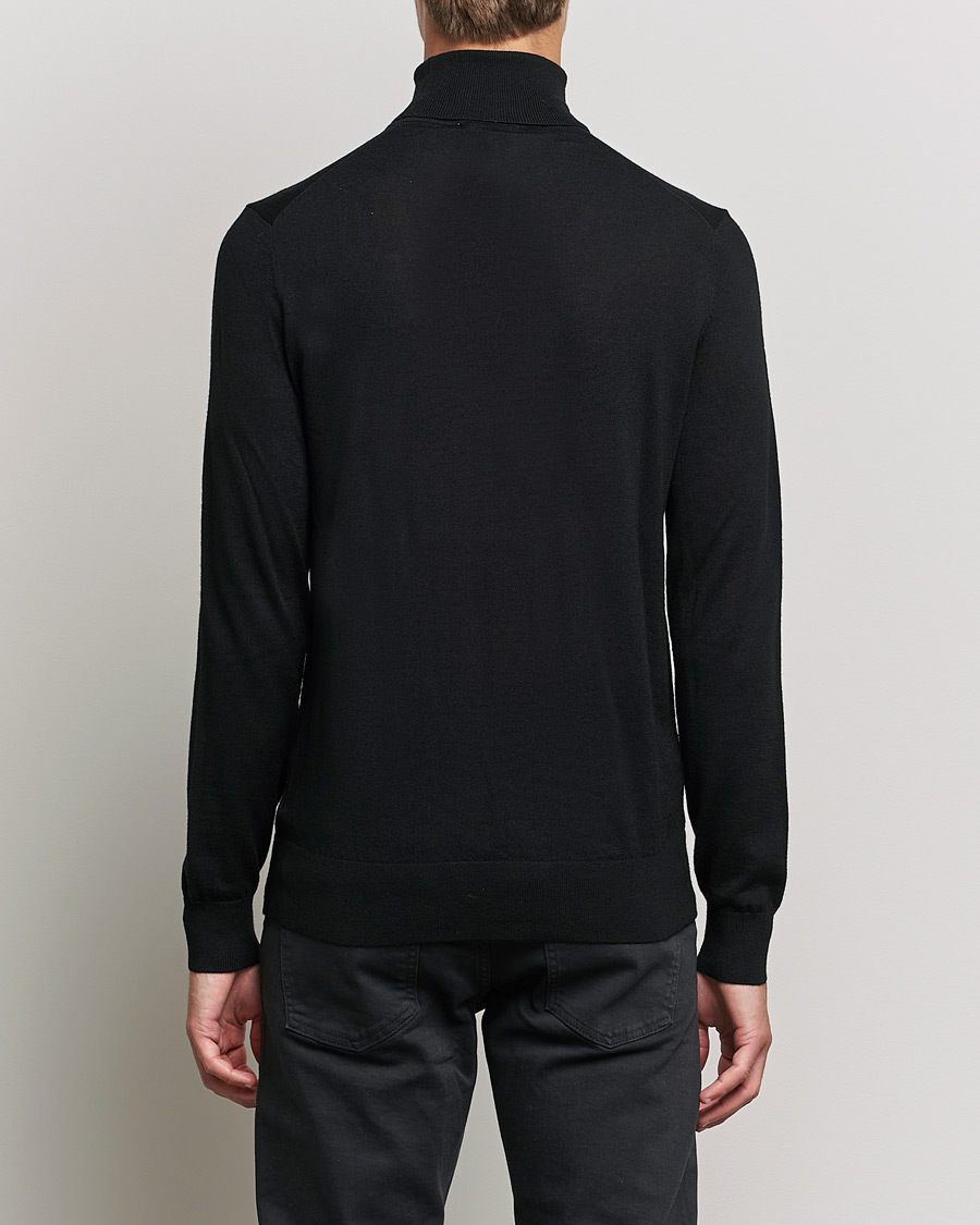 Men | Sweaters & Knitwear | Tiger of Sweden | Neville Extra Fine Merino Polo Black