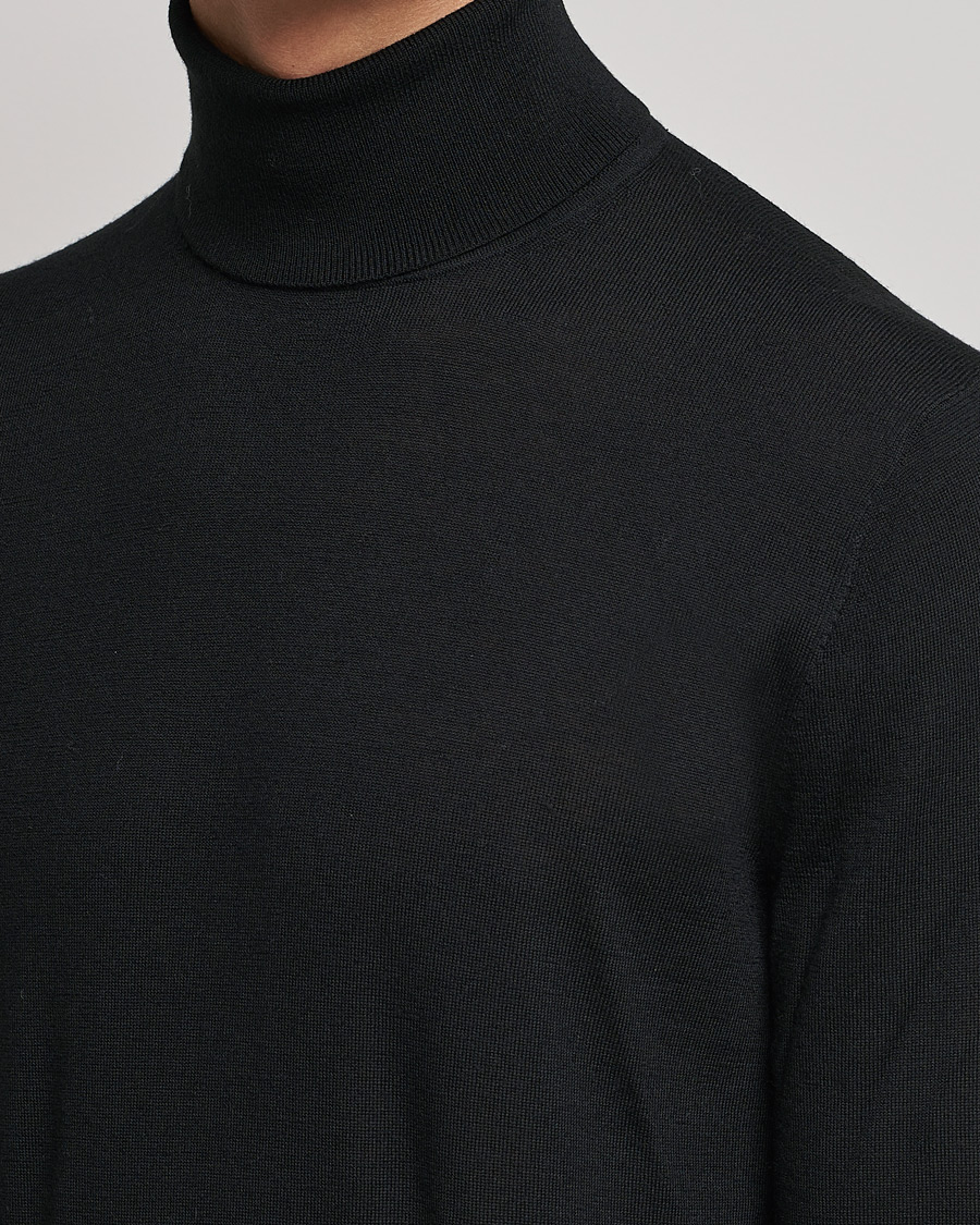 Men | Sweaters & Knitwear | Tiger of Sweden | Neville Extra Fine Merino Polo Black