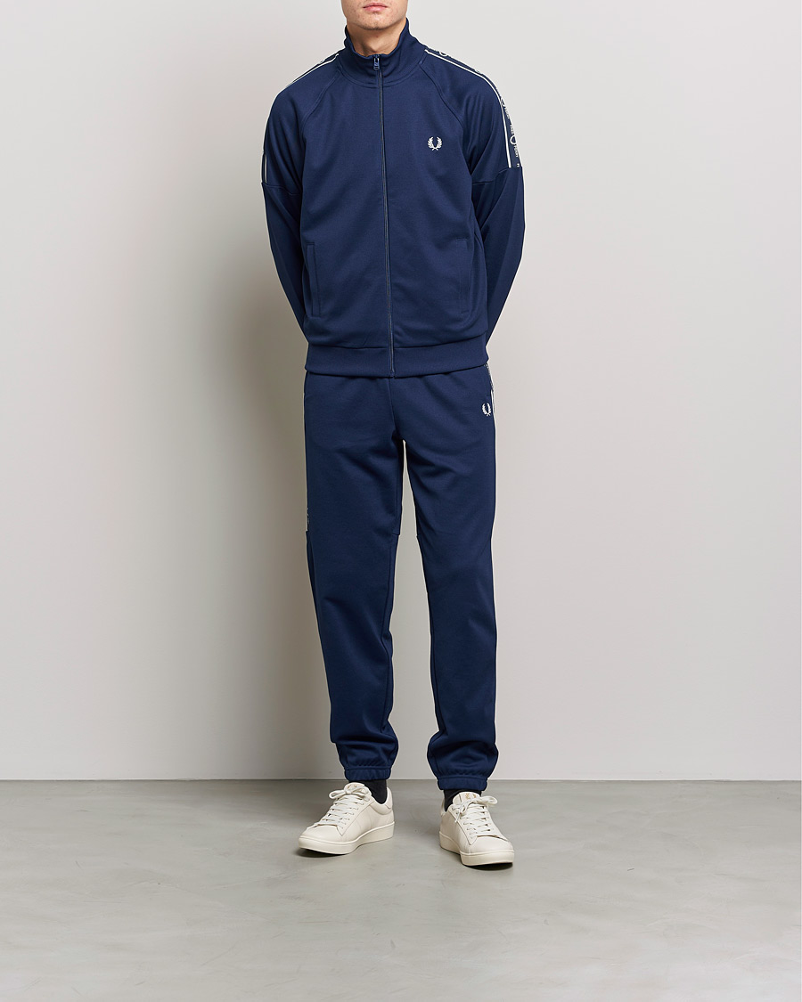 Fred Perry Tapped Sleeve Track Jacket Blue at CareOfCarl.com