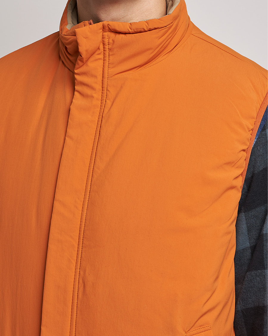 BEAMS PLUS MIL Puffer Vest Orange at CareOfCarl.com