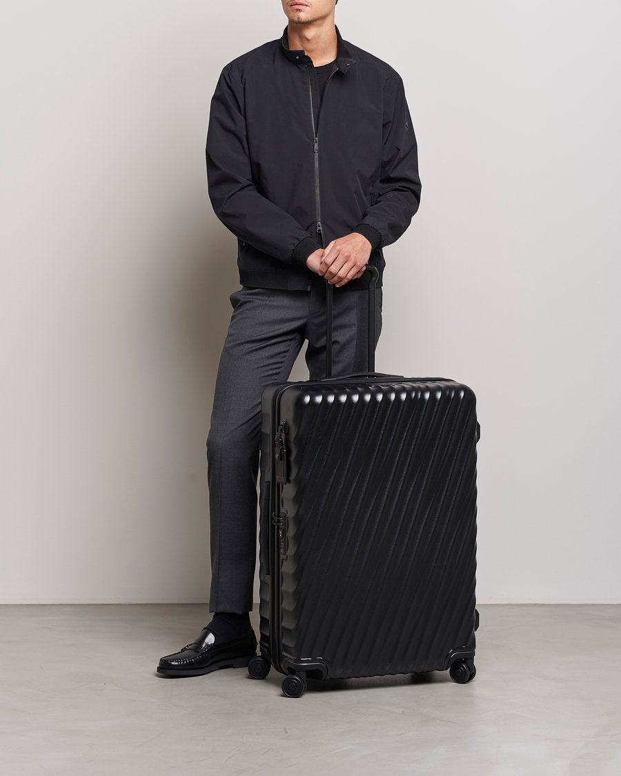 Men | What's new | TUMI | Extended Trip Recycled Packing Case Texture Matt Black