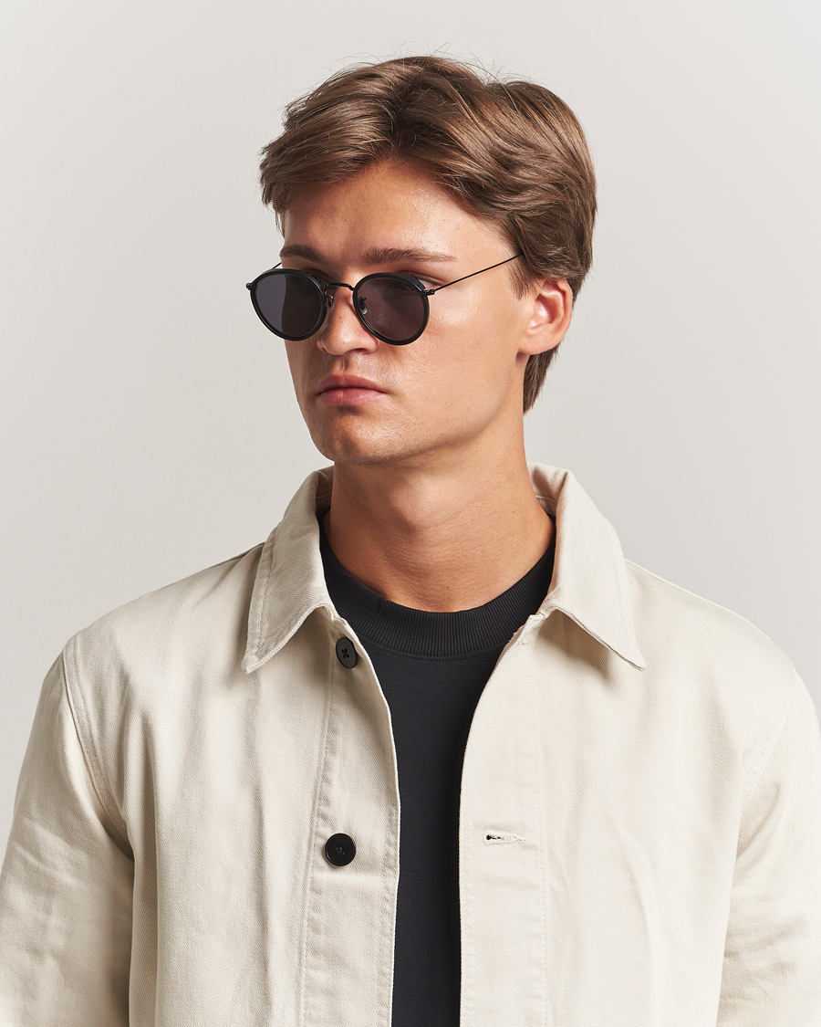 Eyevan 7285 717E Sunglasses Matte Black at CareOfCarl.com