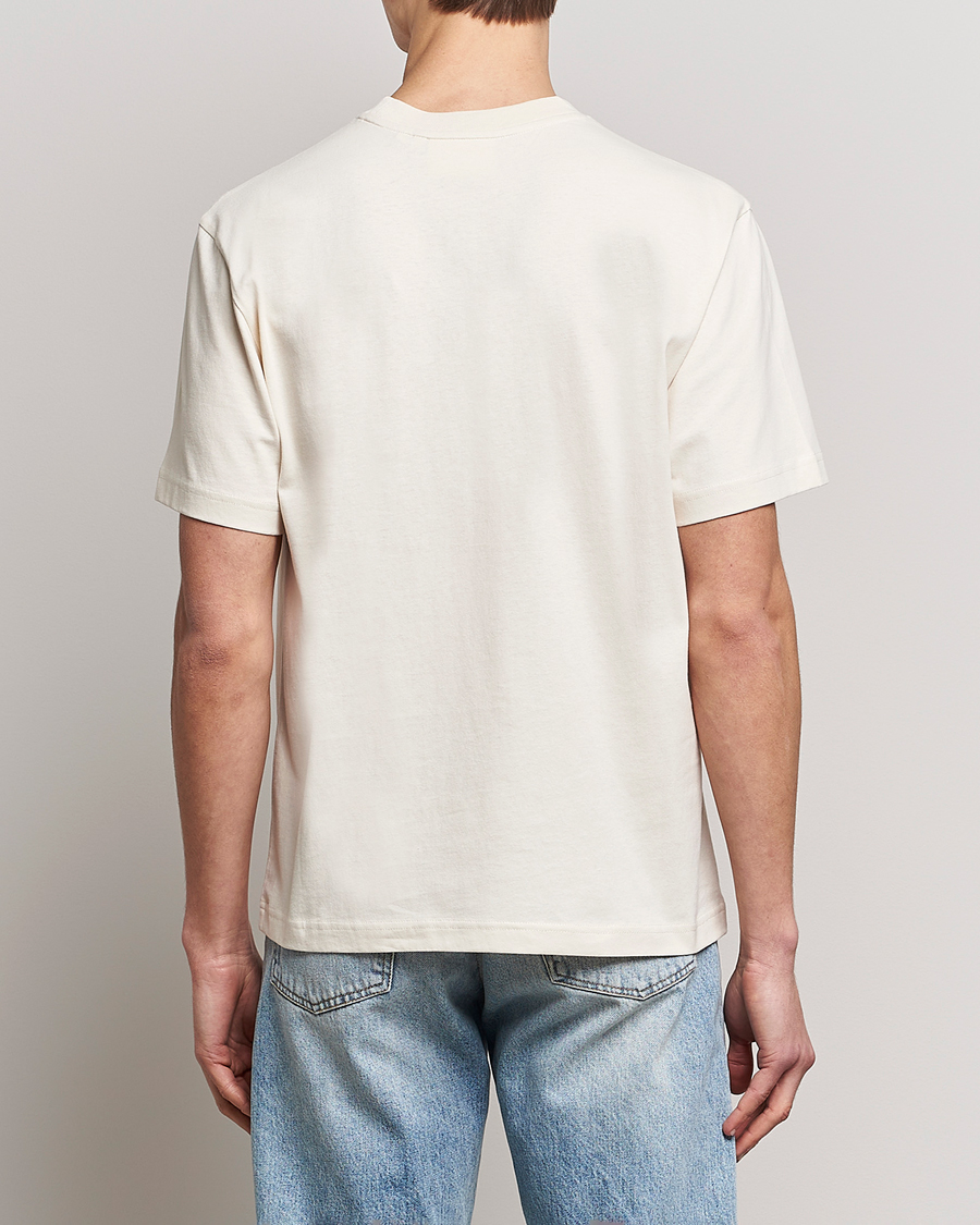Axel Arigato Axel Arc T-Shirt Pale Beige at CareOfCarl.com