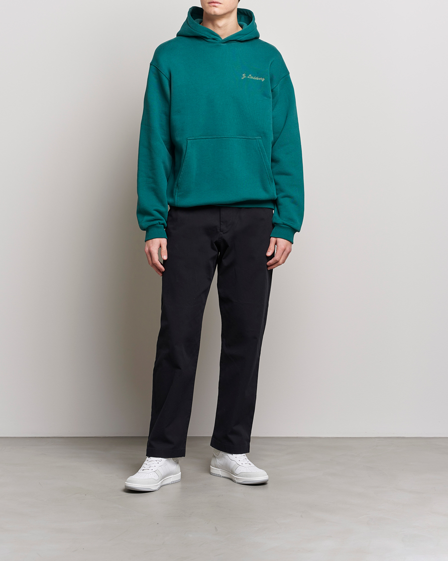 Men | Sweaters & Knitwear | J.Lindeberg | Karson Graphic Organic Cotton Hoodie Rain Forest