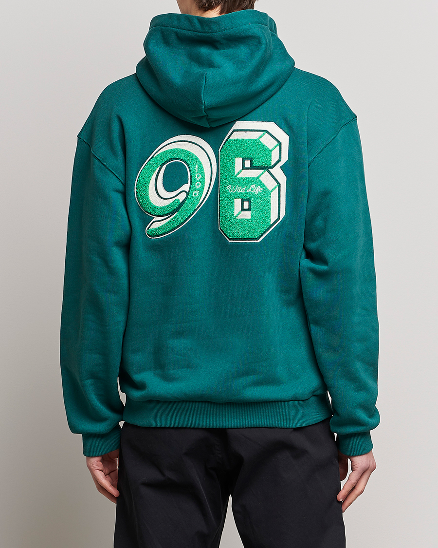 Men | Sweaters & Knitwear | J.Lindeberg | Karson Graphic Organic Cotton Hoodie Rain Forest