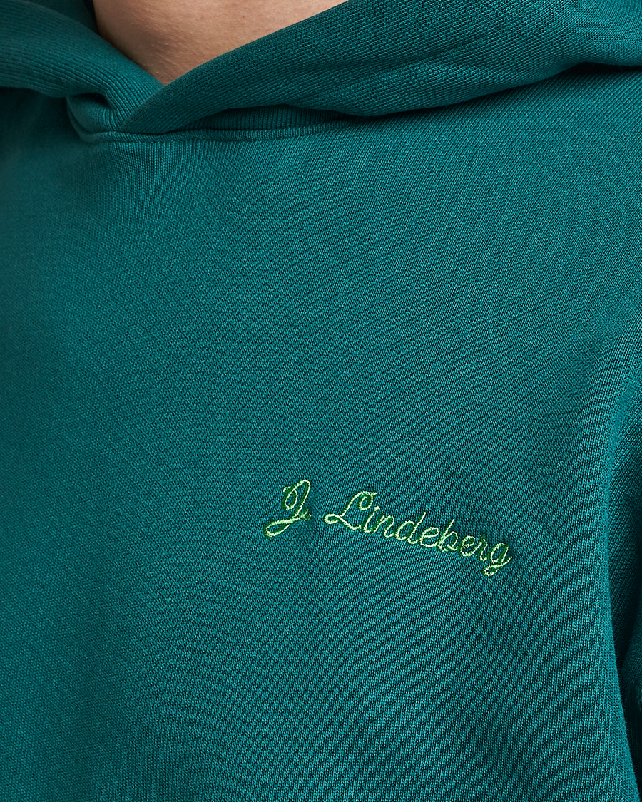Men | Sweaters & Knitwear | J.Lindeberg | Karson Graphic Organic Cotton Hoodie Rain Forest