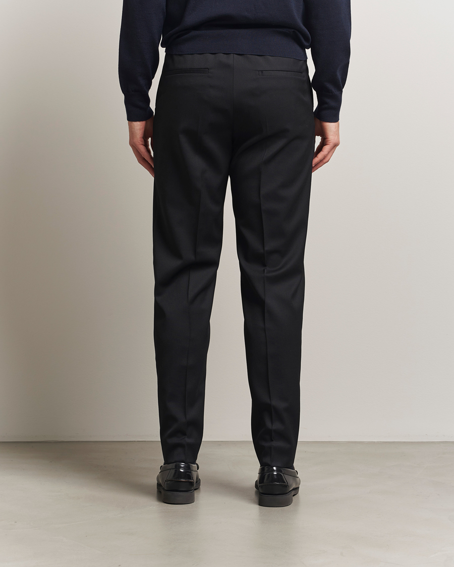 Men | Trousers | Filippa K | Theo Relaxed Wool Trousers Black