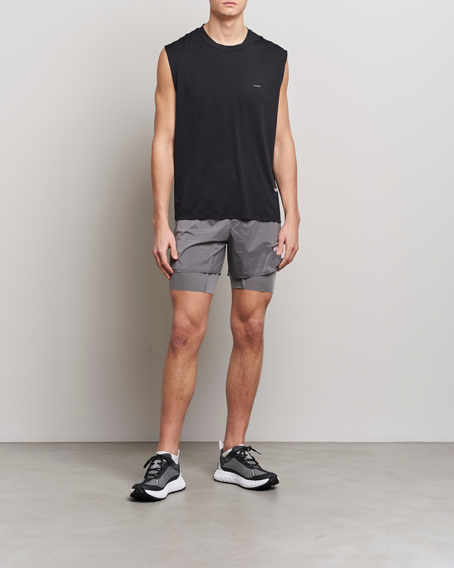 Satisfy AuraLIte Muscle Tee Black at CareOfCarl.com
