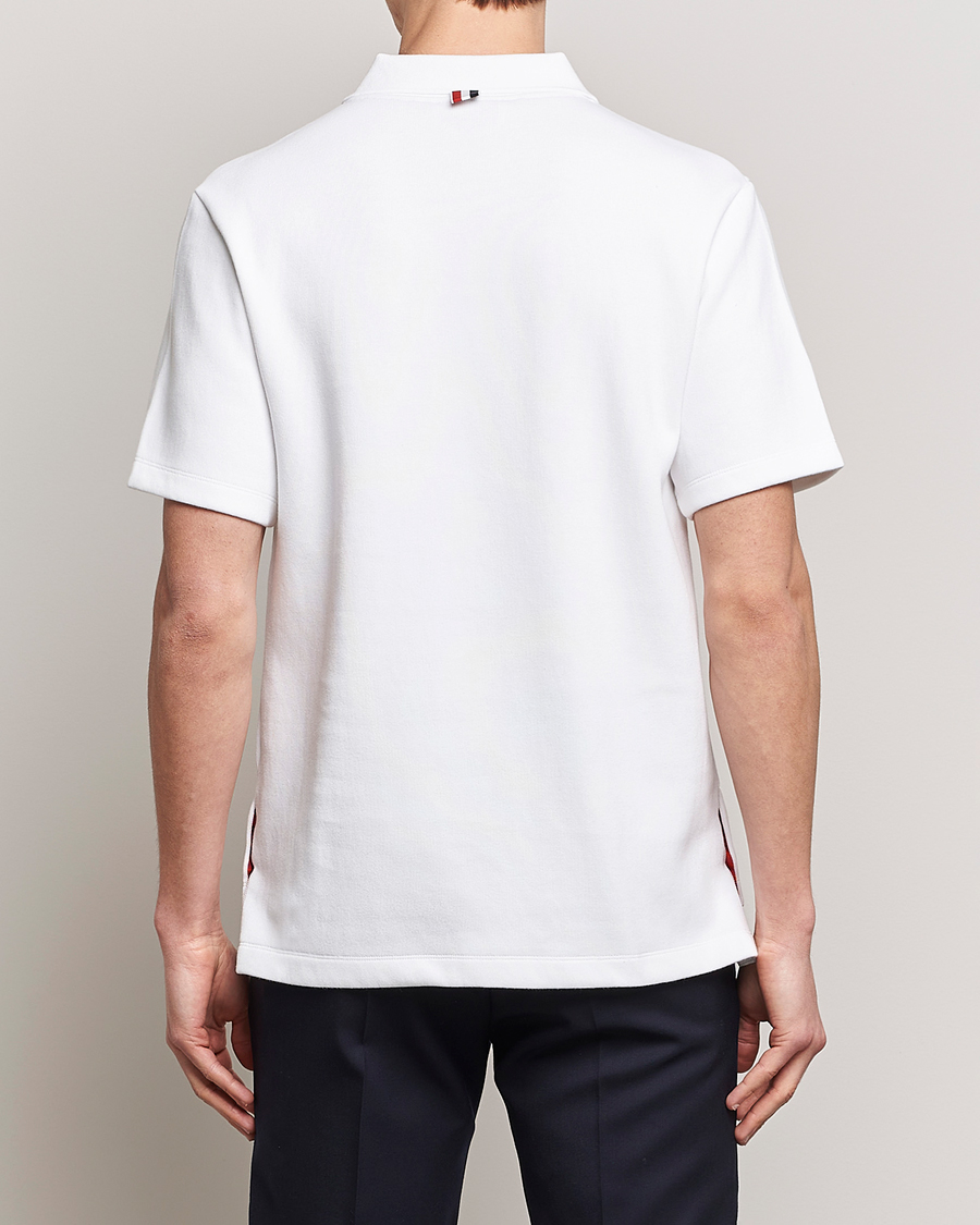 Thom Browne Short Sleeve Pocket Polo White at CareOfCarl.com Thom Browne Short Sleeve Pocket Polo White at CareOfCarl.com
