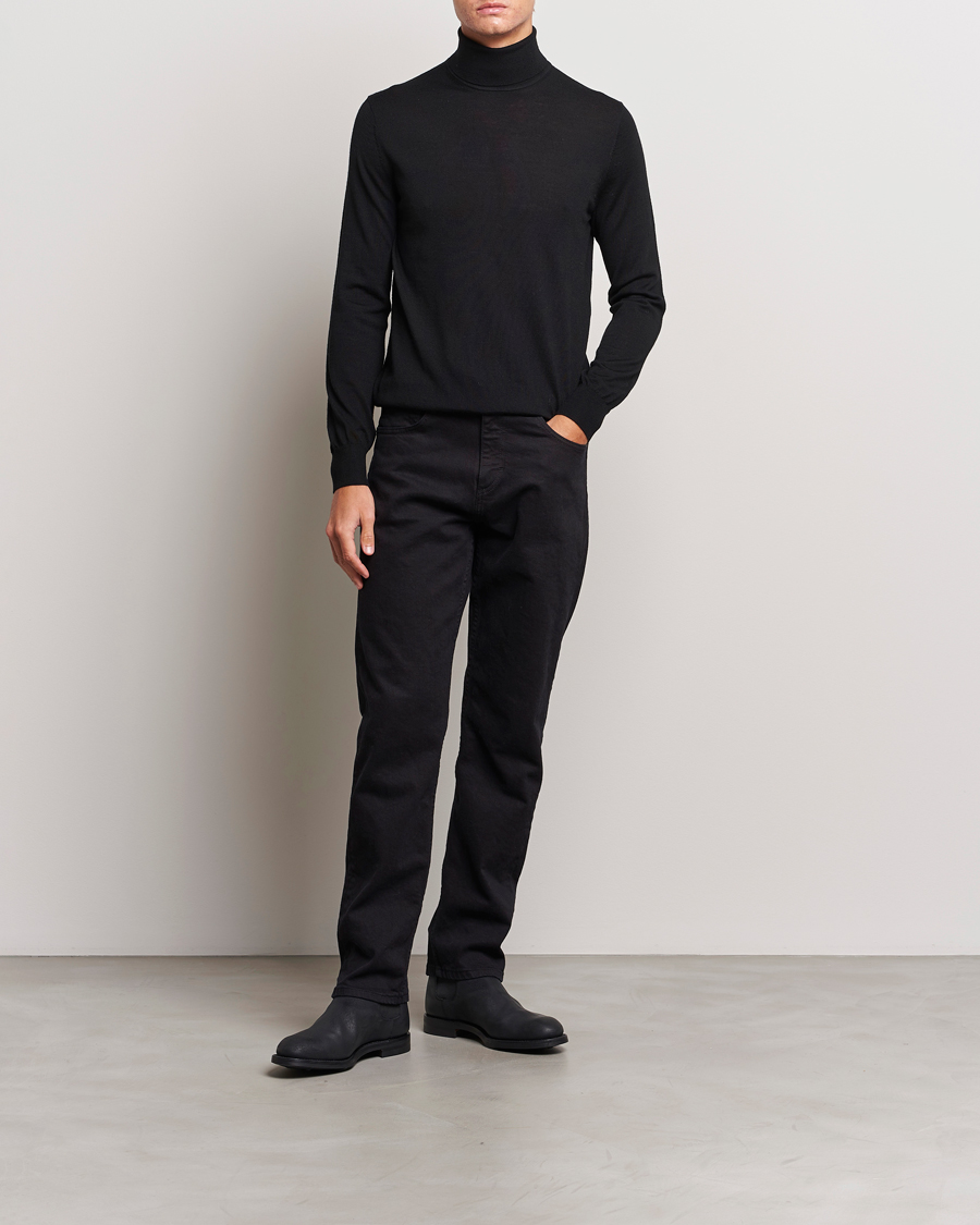Men | Sweaters & Knitwear | Tiger of Sweden | Nevile Extra Fine Merino Polo Black