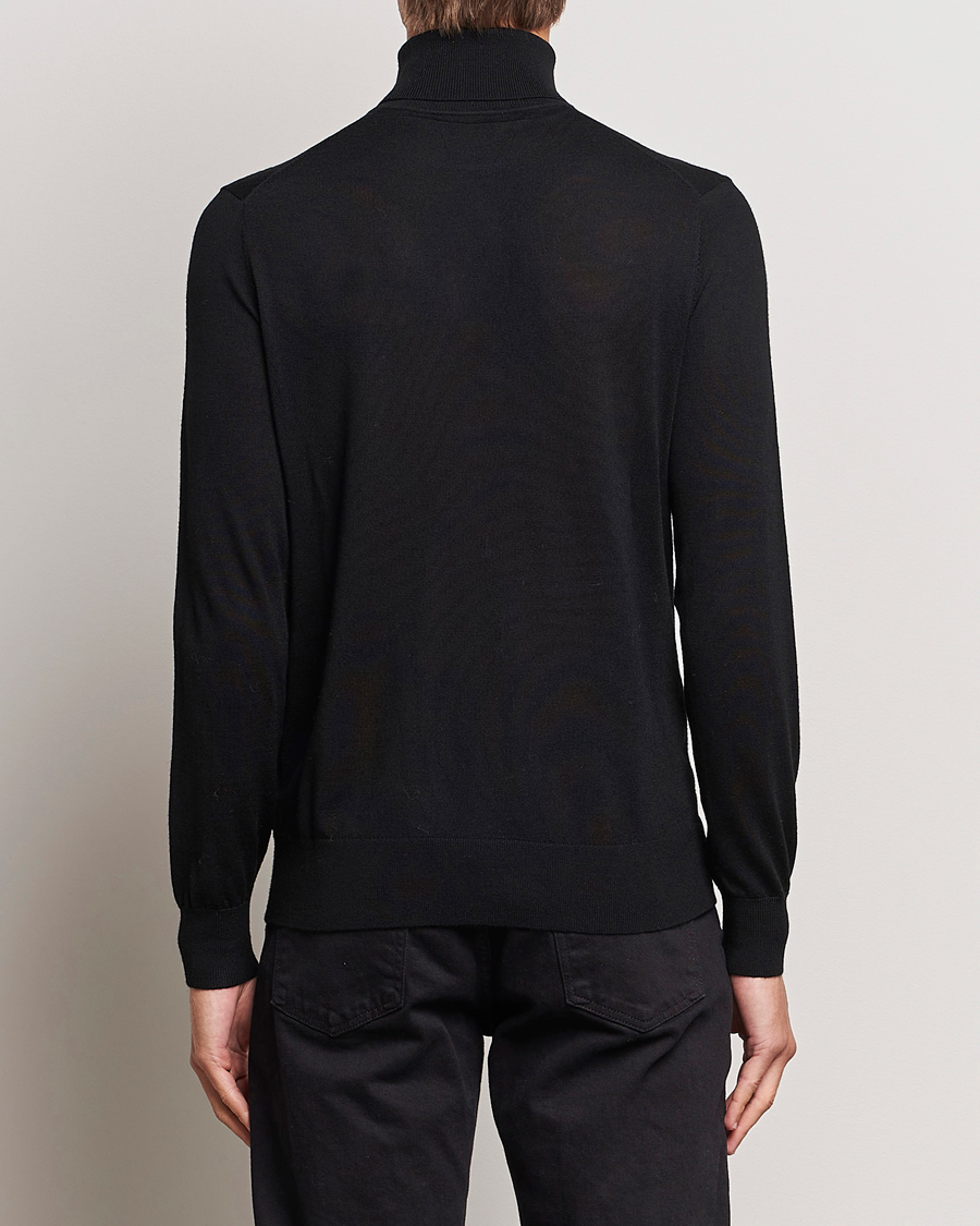 Men | Sweaters & Knitwear | Tiger of Sweden | Nevile Extra Fine Merino Polo Black