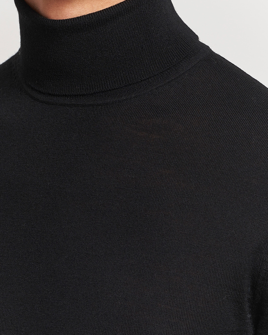 Men | Sweaters & Knitwear | Tiger of Sweden | Nevile Extra Fine Merino Polo Black