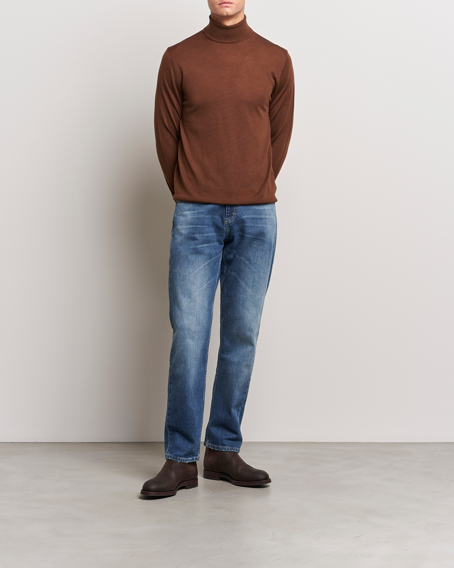 Men | Sweaters & Knitwear | Tiger of Sweden | Nevile Extra Fine Merino Polo Golden Copper