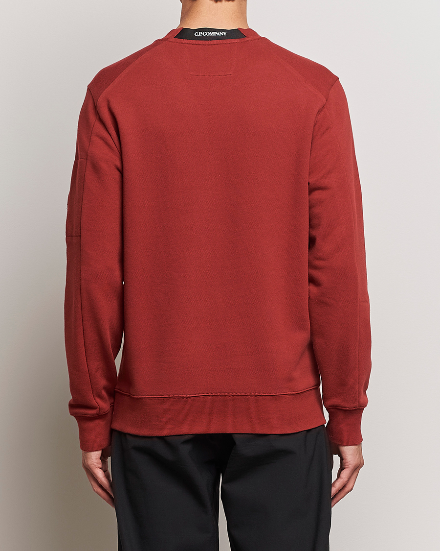 Men | Sweaters & Knitwear | C.P. Company | Diagonal Raised Fleece Lens Sweatshirt Wine