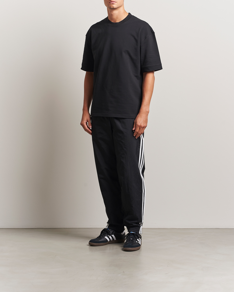 Men | Trousers | adidas Originals | Firebird Track Pants Black/White