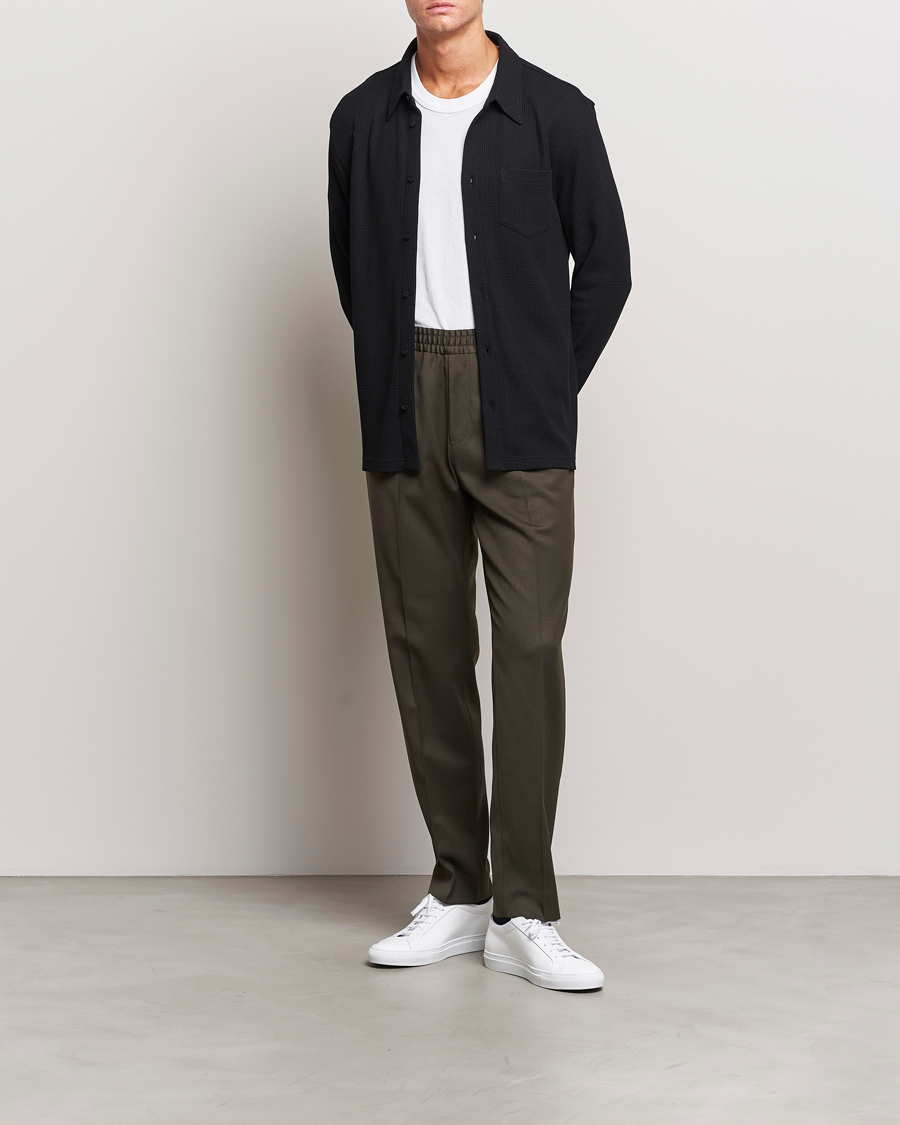 Men | Trousers | Filippa K | Relaxed Terry Wool Trousers Dark Forest Green