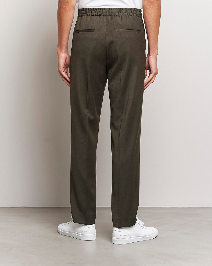 Men | Trousers | Filippa K | Relaxed Terry Wool Trousers Dark Forest Green