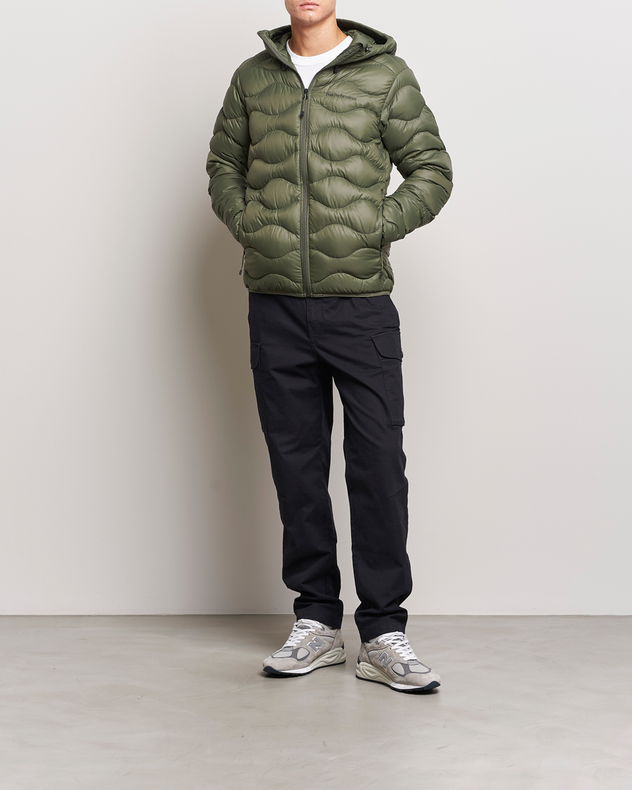 Men | Coats & Jackets | Peak Performance | Helium Down Hooded Jacket Pine Needle