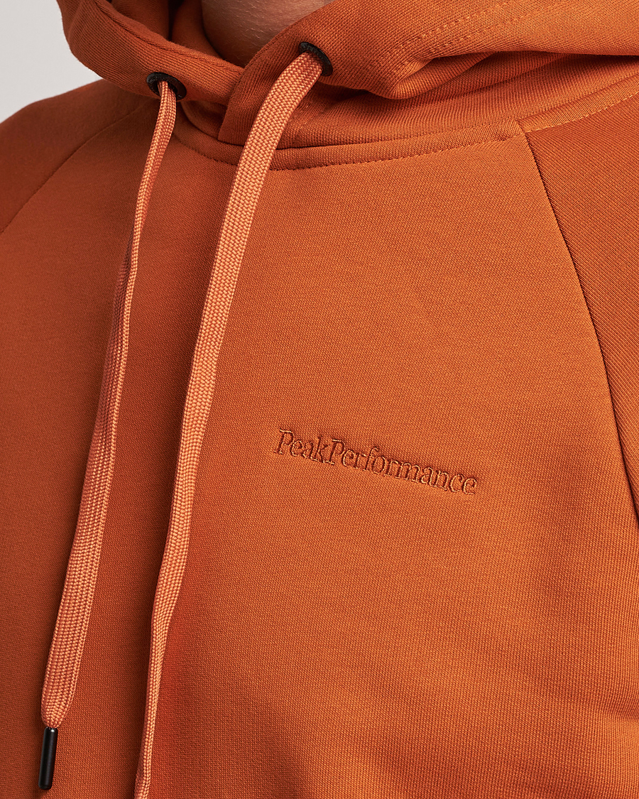 Men | Sweaters & Knitwear | Peak Performance | Original Logo Hoodie Gold Flame