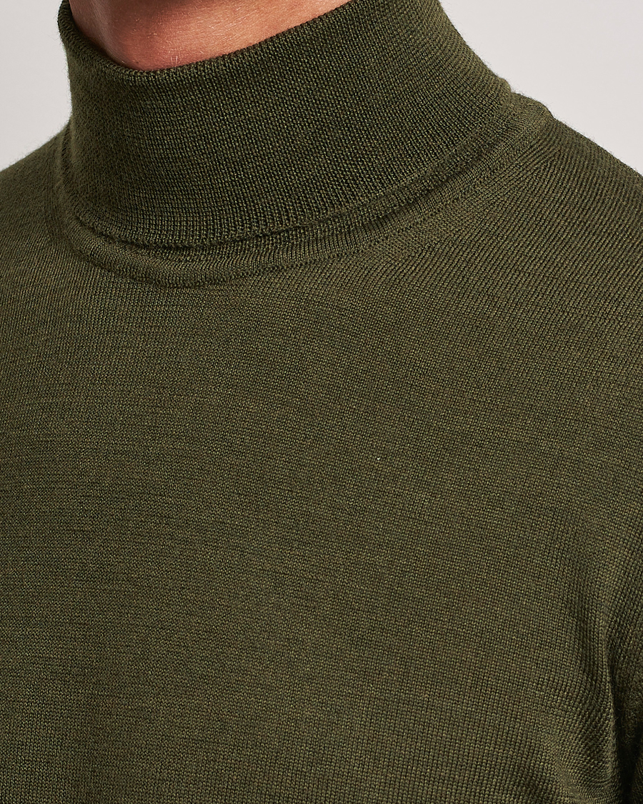 Men | Sweaters & Knitwear | J.Lindeberg | Lyd True Merino Polo Forest Green