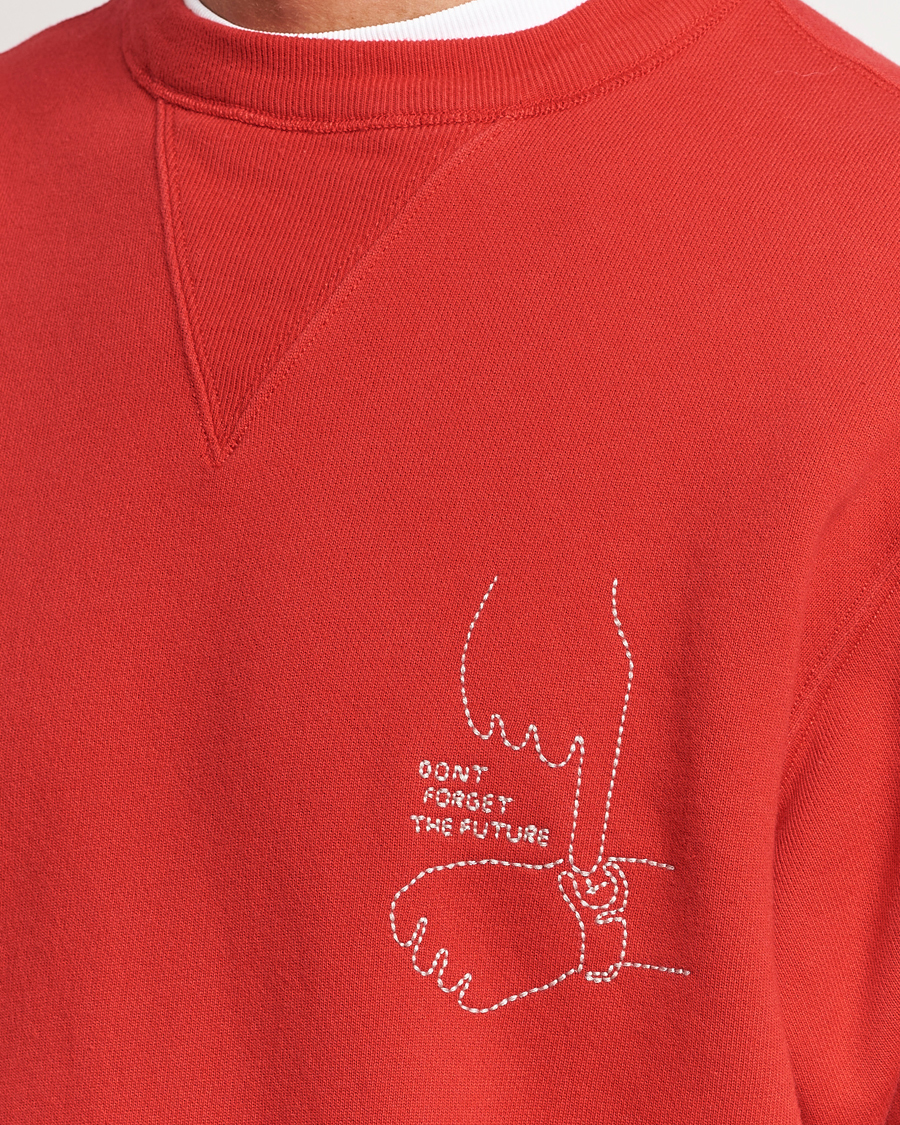 Men | Sweaters & Knitwear | Nudie Jeans | Lasse Future Crew Neck Sweatshirt Red Alert