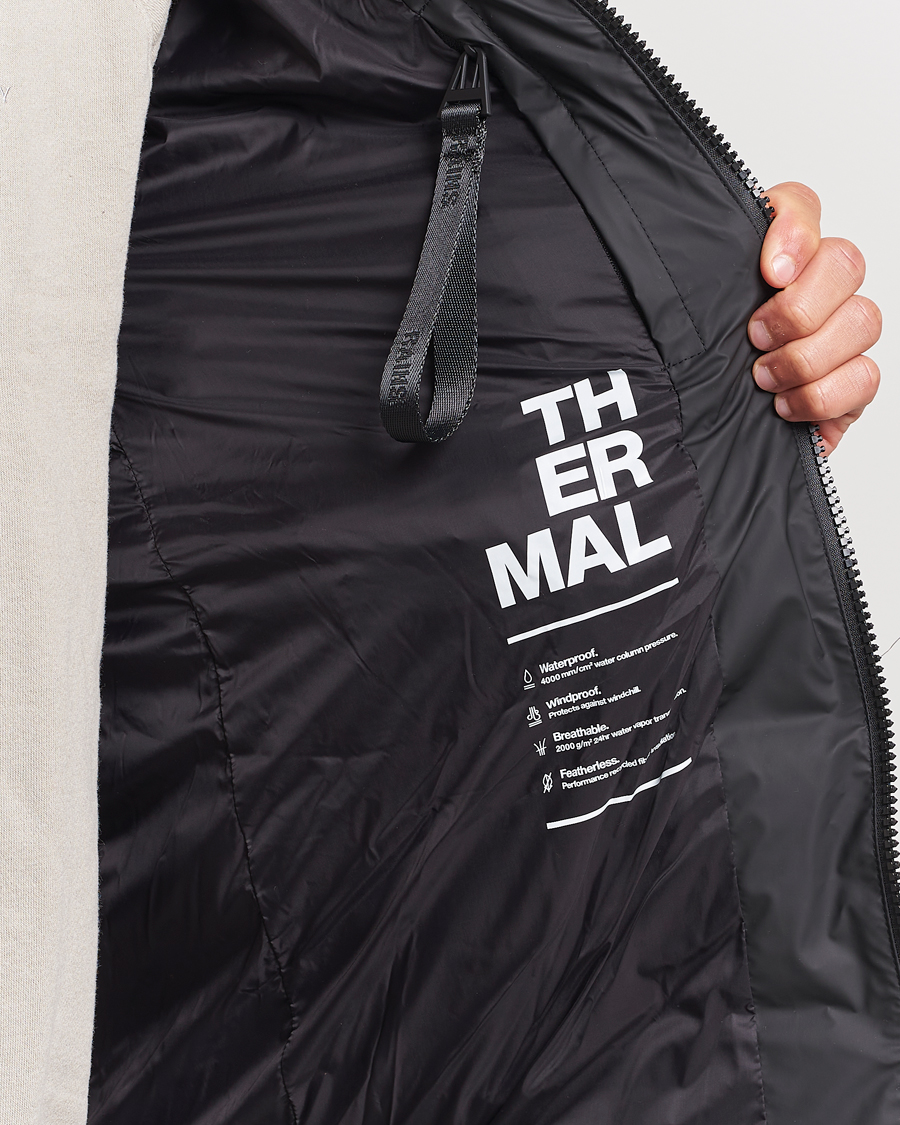 Men | Coats & Jackets | RAINS | Alta Puffer Parka Black