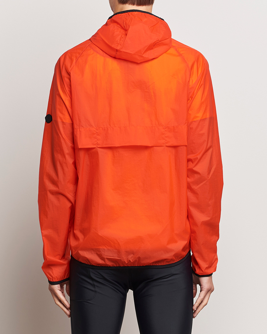 Men | Coats & Jackets | District Vision | Ultralight Packable DWR Wind Jacket Tangerine