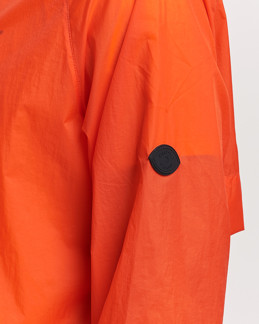 Men | Coats & Jackets | District Vision | Ultralight Packable DWR Wind Jacket Tangerine