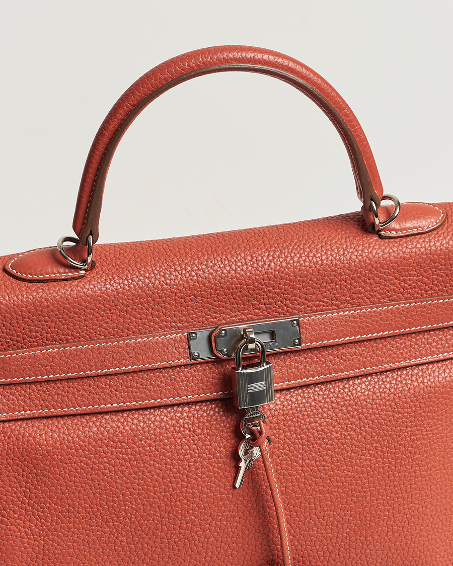 Men | Hermès Pre-Owned Kelly 35 Handbag Taurillion Clemence Orange | Hermès Pre-Owned | Kelly 35 Handbag Taurillion Clemence Orange