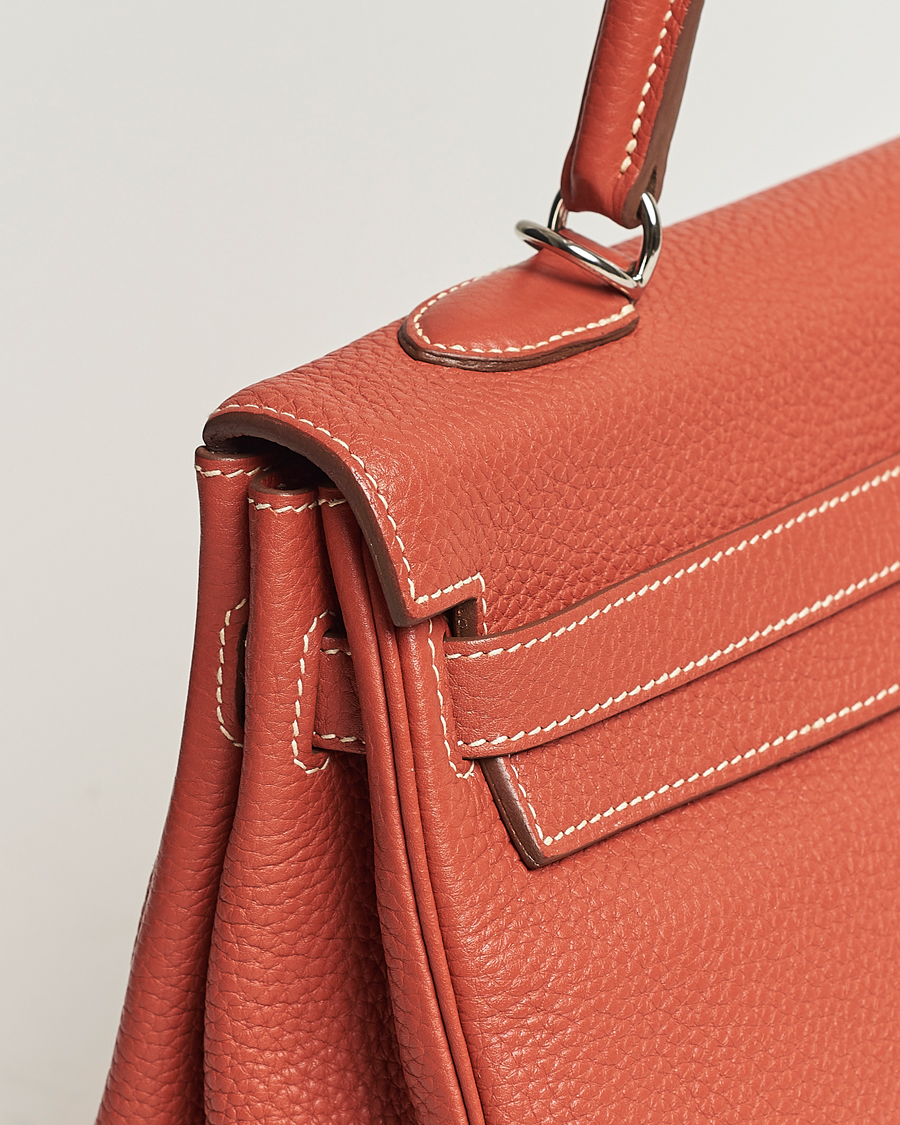 Men | Hermès Pre-Owned Kelly 35 Handbag Taurillion Clemence Orange | Hermès Pre-Owned | Kelly 35 Handbag Taurillion Clemence Orange