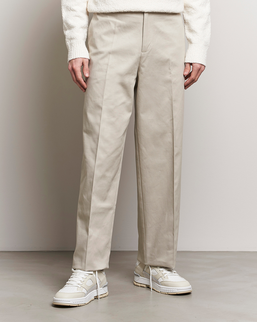 Men |  | Axel Arigato | Serif Relaxed Fit Trousers Pale Beige