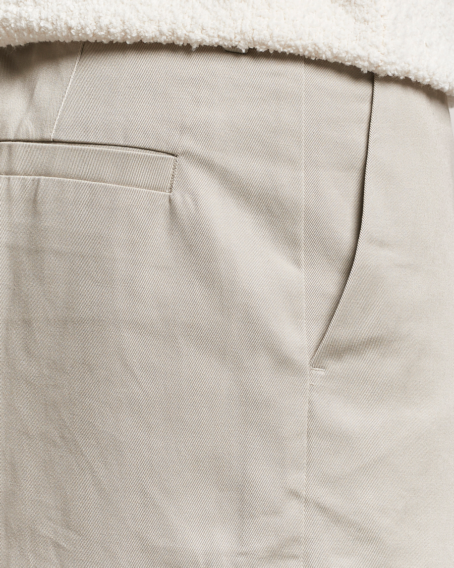 Men | Trousers | Axel Arigato | Serif Relaxed Fit Trousers Pale Beige