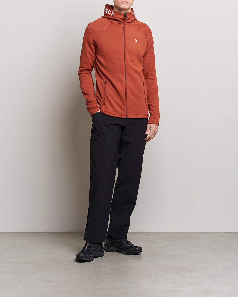Men | Sweaters & Knitwear | Peak Performance | Rider Hooded Full Zip Spiced