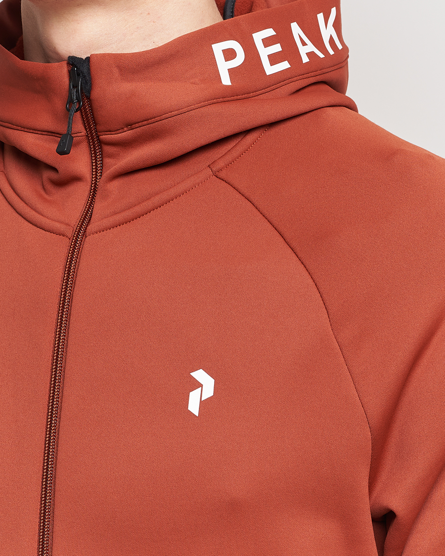 Men | Sweaters & Knitwear | Peak Performance | Rider Hooded Full Zip Spiced